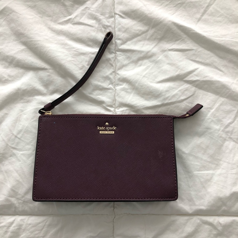 burgundy Kate spade wristlet some wear